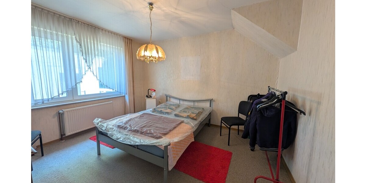 Großes Grundstück in Hüllhorst: Einfamilienhaus mit Potenzial zur Neugestaltung - Einfamilienhaus Hüllhorst | Angebot:26549649