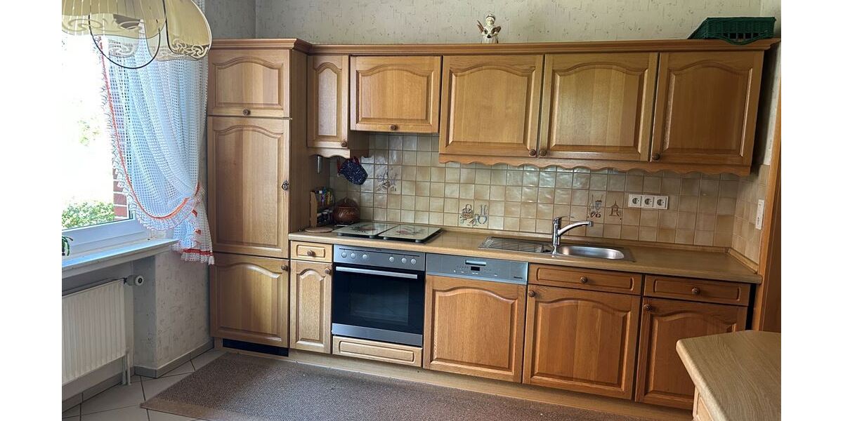 Interessantes Wohnhaus mit 2 Wohnungen, Nebengebäude und Grünland - Einfamilienhaus Stolzenau | Angebot:26858258