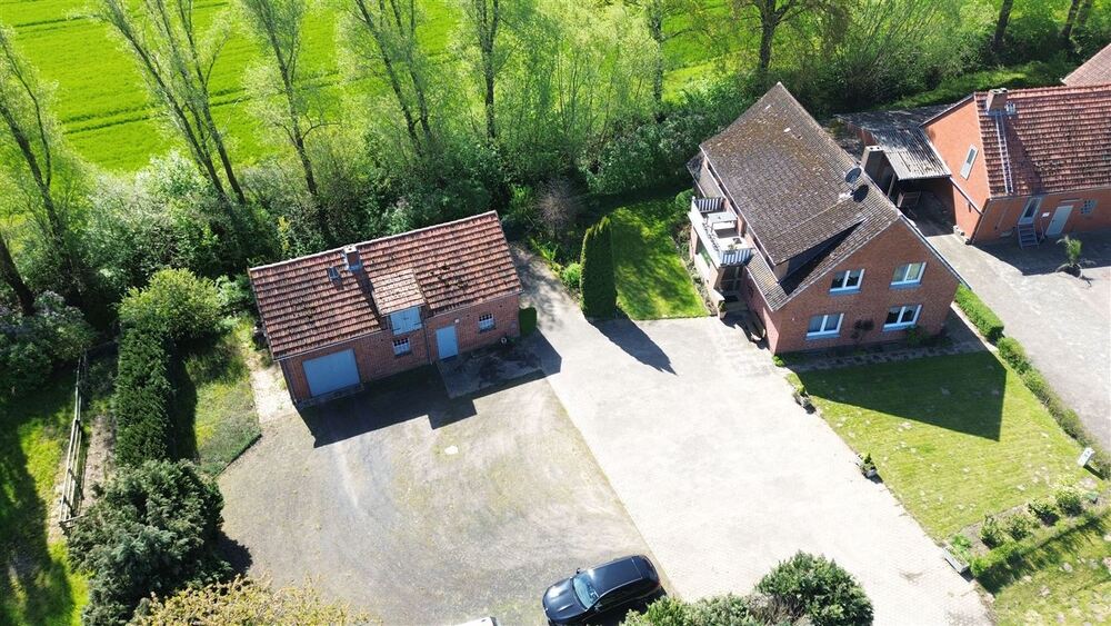 Interessantes Wohnhaus mit 2 Wohnungen, Nebengebäude und Grünland - Einfamilienhaus Stolzenau | Angebot:26858258