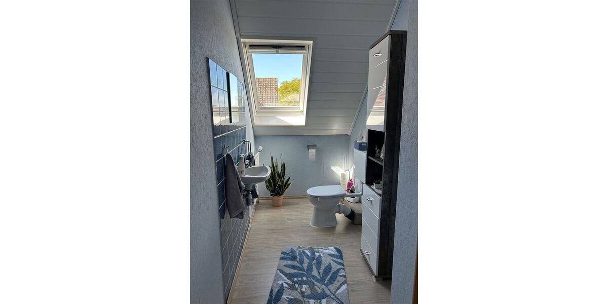 Interessantes Wohnhaus mit 2 Wohnungen, Nebengebäude und Grünland - Einfamilienhaus Stolzenau | Angebot:26858258
