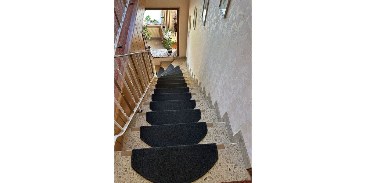 Interessantes Wohnhaus mit 2 Wohnungen, Nebengebäude und Grünland - Einfamilienhaus Stolzenau | Angebot:27142431