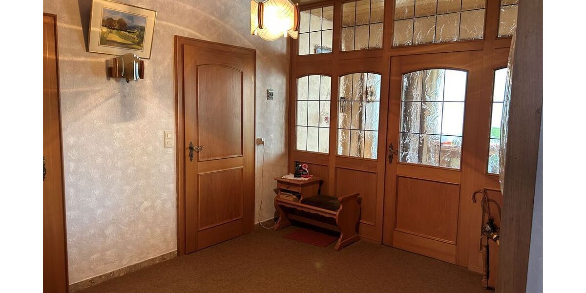 Interessantes Wohnhaus mit 2 Wohnungen, Nebengebäude und Grünland - Einfamilienhaus Stolzenau | Angebot:26858258