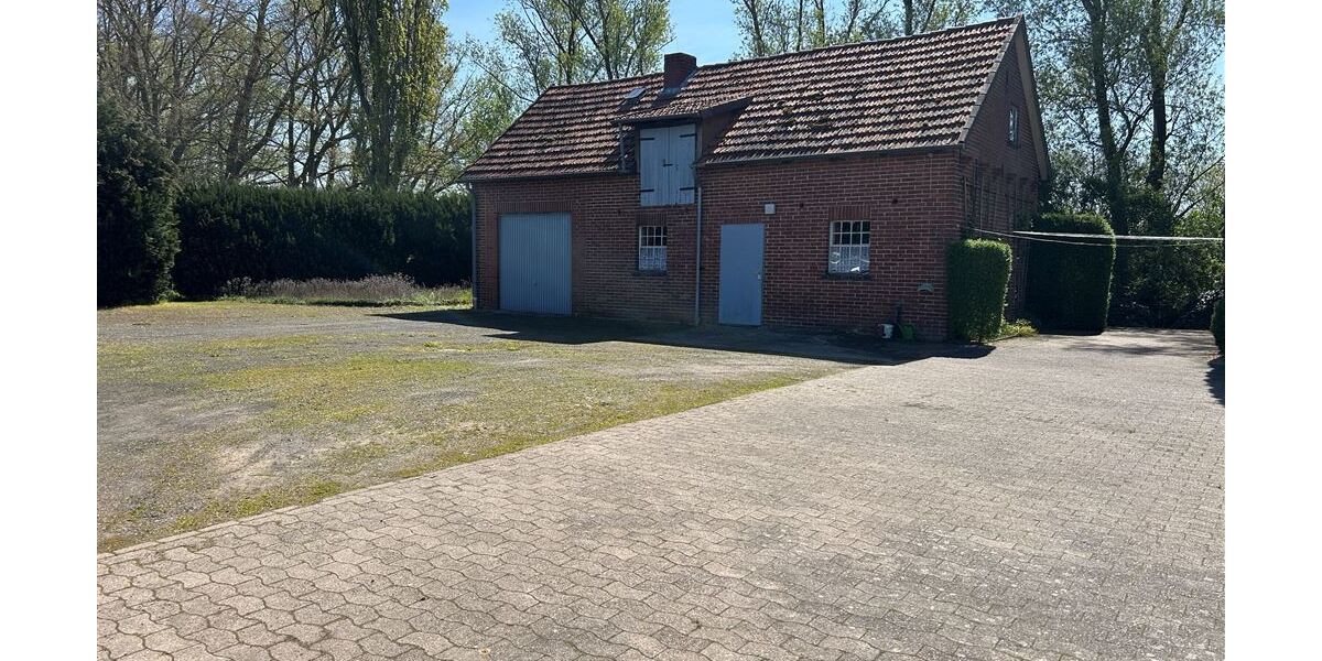 Interessantes Wohnhaus mit 2 Wohnungen, Nebengebäude und Grünland - Einfamilienhaus Stolzenau | Angebot:26858258