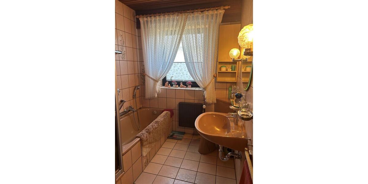 Vielseitiges Einfamilienhaus mit viel Platz und Potenzial in zentraler Lager von Stolzenau - Bungalow Stolzenau | Angebot:26858113