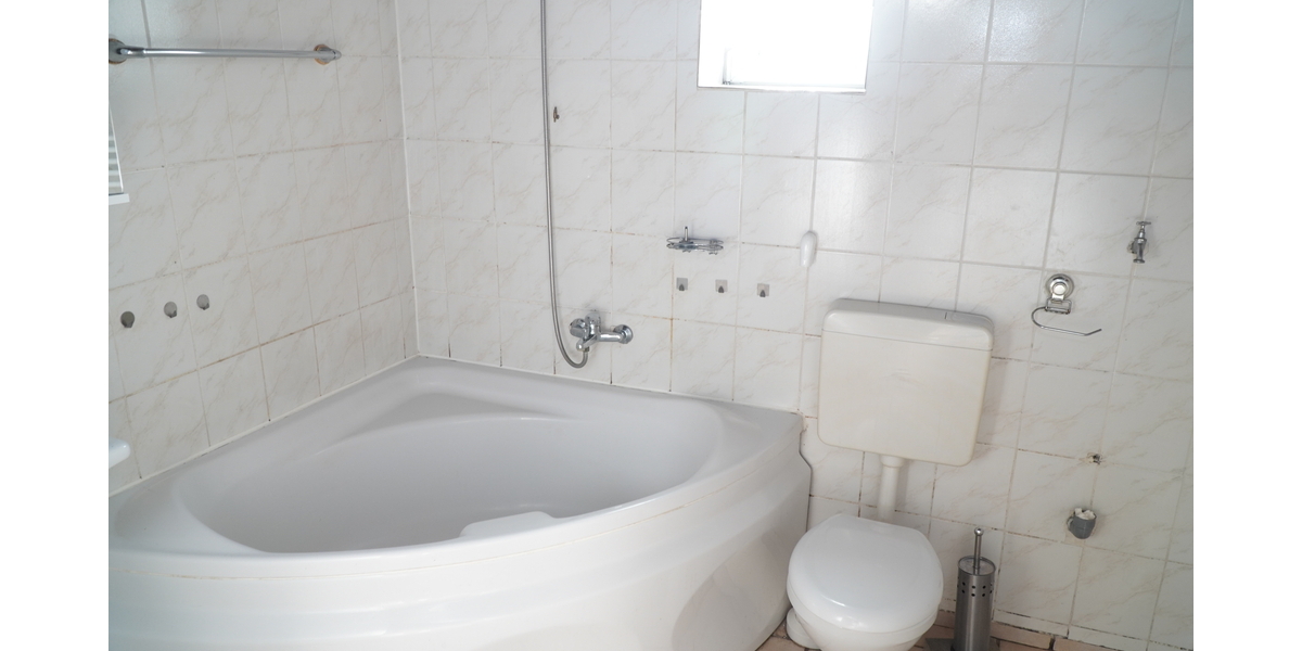 Gemütliches Einfamilienhaus mit Kamin, Doppelgarage und Erweiterungspotenzial - Einfamilienhaus Porta Westfalica | Angebot:19439640